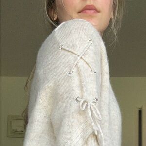 BP. Crème sweater